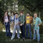 16-05-1977 Little River Band on location in Amsterdam.

[keywords]Posed, Full Length, Eyecontact, Smiling, Musicians[/keywords]